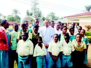 Fr. Arisukwu with the visually impaired at Obudu
